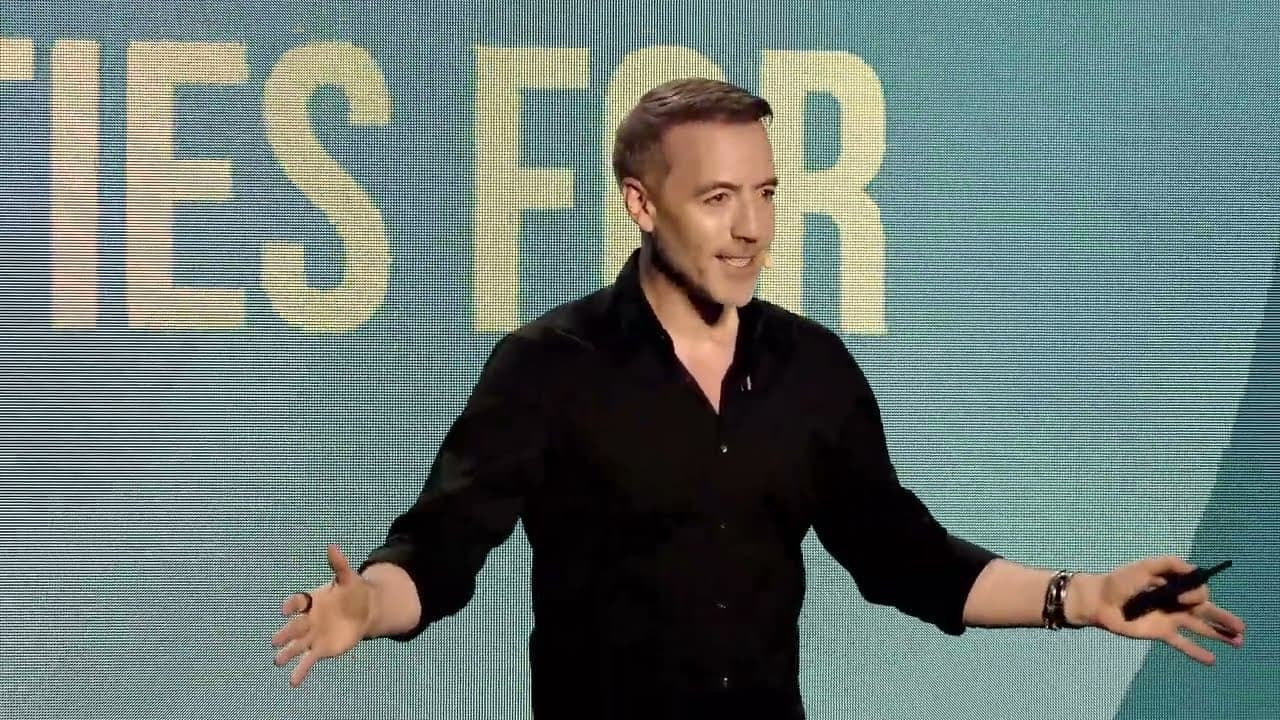 Reeve Collins on stage at Blockchain Life 2025